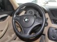 BMW X1 xDrive28i 2011 - Cần bán lại xe BMW X1 xDrive28i đời 2011, màu trắng, nhập khẩu nguyên chiếc