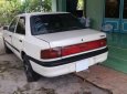 Mazda 323 MT 1995 - Xe Mazda 323 MT đời 1995, màu trắng, giá chỉ 72 triệu