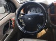 Ford Escape 2.3 AT 2004 - Bán Ford Escape 2.3 AT đời 2004, màu đen  