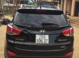 Hyundai Tucson 2011 - Cần bán Hyundai Tucson sản xuất 2011, màu đen, xe nhập