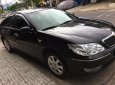 Toyota Camry G 2005 - Bán Toyota Camry G 2005, màu đen số sàn, giá chỉ 460 triệu