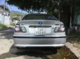 BMW 3 Series  318i 2004 - Cần bán lại xe BMW 3 Series 318i đời 2004, màu bạc