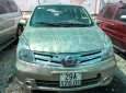 Nissan Grand livina 2011 - Bán xe Nissan Grand livina đời 2011, màu vàng 