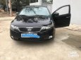 Kia Forte 2011 - Bán ô tô Kia Forte đời 2011, màu đen, giá 390tr