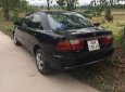 Mazda 323 MT 2000 - Bán Mazda 323 MT đời 2000, màu đen, xe nhập số sàn, 115 triệu