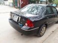 Ford Laser GHIA 1.8 AT 2004 - Cần bán lại xe Ford Laser GHIA 1.8 AT đời 2004, màu đen, giá 236tr