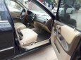 Ford Laser GHIA 1.8 AT 2004 - Cần bán lại xe Ford Laser GHIA 1.8 AT đời 2004, màu đen, giá 236tr