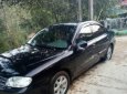 Kia Spectra 1.6 MT 2005 - Cần bán xe Kia Spectra 1.6 MT đời 2005, màu đen số sàn