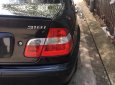 BMW 3 Series 318i  2004 - Bán ô tô BMW 318i năm 2004, màu đen, nhập khẩu nguyên chiếc