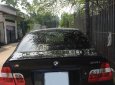 BMW 3 Series 318i  2004 - Bán ô tô BMW 318i năm 2004, màu đen, nhập khẩu nguyên chiếc