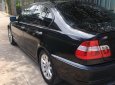 BMW 3 Series 318i  2004 - Bán ô tô BMW 318i năm 2004, màu đen, nhập khẩu nguyên chiếc