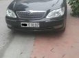 Toyota Camry 2004 - Cần bán gấp Toyota Camry năm 2004, màu đen xe gia đình