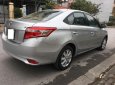 Toyota Vios 1.5E 2014 - Bán lại xe Toyota Vios 1.5E đời 2014, màu bạc