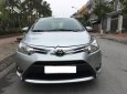 Toyota Vios 1.5E 2014 - Bán lại xe Toyota Vios 1.5E đời 2014, màu bạc