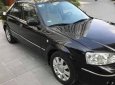 Ford Laser   Deluxe AT 2006 - Bán Ford Laser Deluxe AT đời 2006, màu đen xe gia đình, giá 265tr