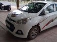 Hyundai Grand i10 1.0 MT 2015 - Chính chủ bán Hyundai Grand i10 1.0 MT đời 2015, màu trắng, nhập khẩu