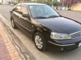 Ford Laser Ghia 1.8 MT 2004 - Bán ô tô Ford Laser GHIA 1.8 MT đời 2004, màu đen xe gia đình, giá chỉ 225 triệu