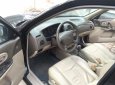 Ford Laser 1.8AT 2005 - Bán Ford Laser 1.8 AT đời 2005, màu đen, giá chỉ 260 triệu