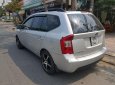 Kia Carens EX 2.0 2010 - Bán Kia Carens EX 2.0 sản xuất 2010, màu bạc xe gia đình