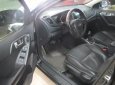 Kia Cerato 1.6 AT 2011 - Cần bán lại xe Kia Cerato 1.6AT đời 2011, màu đen, xe nhập số tự động