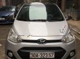 Hyundai Premio 1.0MT 2014 - Cần bán gấp Hyundai Grand i10 1.0MT 2014, màu bạc, nhập khẩu