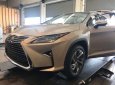 Lexus RX 350L 2018 - Cần bán xe Lexus RX 350L 2019, màu vàng cát, nội thất kem xe nhập Mỹ LH: 0982.84.2838