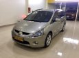 Mitsubishi Grandis 2.4 AT 2009 - Cần bán gấp Mitsubishi Grandis 2.4 AT năm sản xuất 2009, màu vàng  