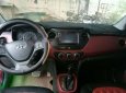 Hyundai Grand i10 1.2 AT 2016 - Bán Hyundai Grand i10 1.2 AT đời 2016, màu đỏ, xe nhập 