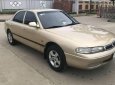 Mazda 626 1995 - Bán Mazda 626 đời 1995, màu vàng cát