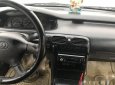 Mazda 626 1995 - Bán Mazda 626 đời 1995, màu vàng cát