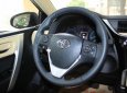 Toyota Corolla altis 1.8E CVT 2018 - Bán Toyota Corolla altis 1.8E CVT sản xuất năm 2018, màu đen, 707tr