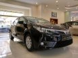 Toyota Corolla altis 1.8E CVT 2018 - Bán Toyota Corolla altis 1.8E CVT sản xuất năm 2018, màu đen, 707tr