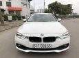 BMW 3 Series  320i 2015 - Cần bán lại xe BMW 3 Series 320i 2015, màu trắng