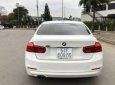 BMW 3 Series  320i  2015 - Cần bán lại xe BMW 3 Series 320i 2015, màu trắng