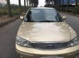 Ford Laser 2004 - Xe Ford Laser sản xuất năm 2004, màu vàng số tự động, giá chỉ 232 triệu