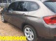 BMW X1 2011 - Cần bán xe BMW X1 sản xuất 2011, màu xám, nhập khẩu nguyên chiếc, giá 635tr