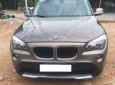 BMW X1 2011 - Cần bán xe BMW X1 sản xuất 2011, màu xám, nhập khẩu nguyên chiếc, giá 635tr