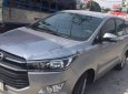 Toyota Innova E 2016 - Bán Toyota Innova E sản xuất năm 2016, màu bạc xe gia đình, giá 686tr