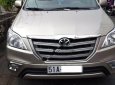 Toyota Innova 2.0E 2014 - Bán Toyota Innova 2.0E sản xuất 2014 xe gia đình, 610tr