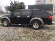 Mitsubishi Triton MT 2011 - Cần bán lại xe Mitsubishi Triton MT đời 2011, màu đen, nhập khẩu