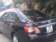 Toyota Corolla altis 1.8G MT 2011 - Chính chủ bán xe Toyota Corolla altis 1.8G MT đời 2011, màu đen