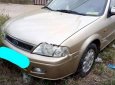 Ford Laser Delu 1.6 MT 2001 - Bán Ford Laser Delu 1.6 MT 2001, màu vàng cát