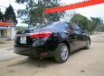 Toyota Corolla altis 2016 - Cần bán Toyota Corolla altis năm sản xuất 2016, màu đen xe gia đình, giá chỉ 690 triệu