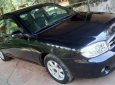 Kia Spectra 2004 - Cần bán lại xe Kia Spectra đời 2004, màu đen, còn mới, giá cạnh tranh