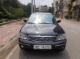 Ford Laser GHIA 1.8 AT 2004 - Bán Ford Laser GHIA 1.8 AT sản xuất năm 2004, màu đen  