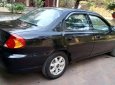 Kia Spectra 2004 - Cần bán lại xe Kia Spectra đời 2004, màu đen, còn mới, giá cạnh tranh