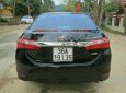 Toyota Corolla altis 2016 - Cần bán Toyota Corolla altis năm sản xuất 2016, màu đen xe gia đình, giá chỉ 690 triệu