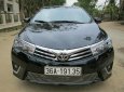 Toyota Corolla altis 2016 - Cần bán Toyota Corolla altis năm sản xuất 2016, màu đen xe gia đình, giá chỉ 690 triệu