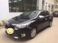 Toyota Vios 1.5E 2016 - Cần bán lại xe Toyota Vios 1.5E sản xuất 2016, màu đen số sàn