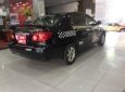 Toyota Corolla altis 2003 - Bán Toyota Corolla Altis sản xuất năm 2003, màu đen số sàn